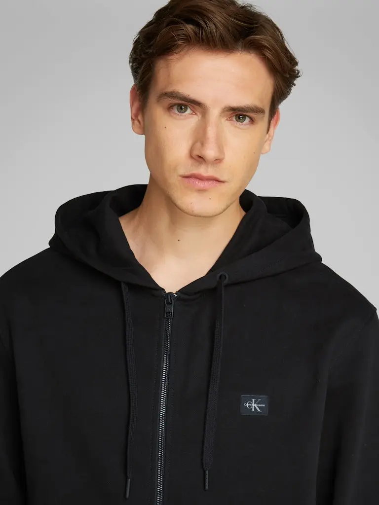 WOVEN LABEL ZIP THROUGH HOODIE